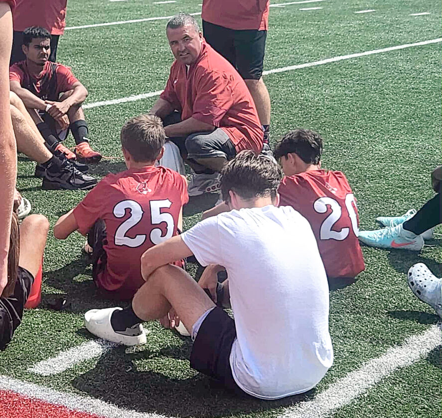Big Red boys roll to a victory in homer opener